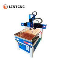 Petit routeur CNC 2x3 pieds publicité bois routeurs CNC Machine 6090 avec roue de pression pour bois MDF teck chêne