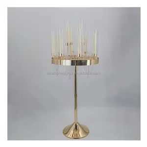 9アームの結婚式のイベントは、結婚式のテーブルにゴールドメタルの丸い背の高いガラスの燭台のセンターピースを使用します