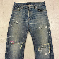 Pantalon de jean classique délavé à l'acide OEM éclaboussures de peinture déchirée par des éclaboussures Streetwear à moustaches Broderie vintage Prix compétitif