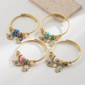 Bracelets jonc ajustables en acier inoxydable <span class=keywords><strong>avec</strong></span> pendentif œil porte-bonheur et main de Hamsa en alliage, décor de perles assorties, bijoux de mode pour femmes - Product Image 1
