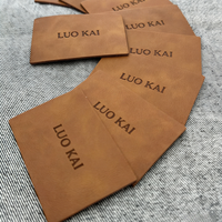 Étiquette en cuir gaufré, étiquette en cuir imprimée, type de couture personnalisable, cuir écologique pour étiquettes de jeans, designs d'étiquettes pour jeans