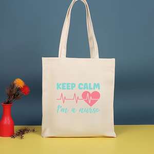 กระเป๋าสะพายไหล่ลายพิมพ์พยาบาลน่ารัก กระเป๋าถือรักษ์โลกสำหรับผู้หญิง กระเป๋าผ้าแคนวาสแฟชั่นความจุมาก - Product Image 1