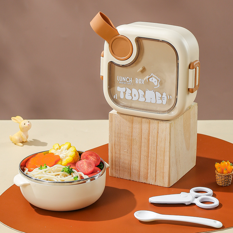Fiambrera infantil beige para alimentos complementarios.