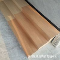 Carreaux de marche d'escalier Grain de bois mat Bord d'arc antidérapant Carreau de marche en céramique monobloc pour escalier