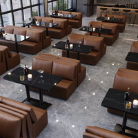 Ensemble de sièges et table de style industriel pour les bars et les pubs, canapé rembourré en cuir avec table en marbre noir