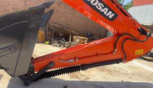 รถตักล้อยาง Doosan DX225 มือสองจากเกาหลี ขนาด 22 ตัน พร้อมมอเตอร์ PLC และระบบเกียร์ไฮดรอลิก มีสินค้าในสต็อก - Product Image 3