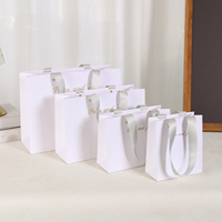 Sacs en papier blancs personnalisables de luxe avec logo estampé à chaud pour lunettes et montres, réutilisables avec ruban