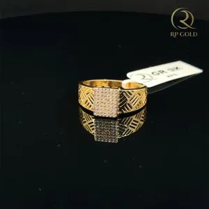 Elegant <b>gold</b> <b>ring</b> with geometric pattern and sparkling stone centerpiece perfect for stylish everyday wear - Product Image 1