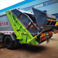 Camion de collecte des déchets compactés à benne triangulaire de 10 mètres cubes Dongfeng Huashen T3