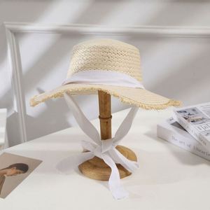 Chapeau de soleil tissé à bord large en papier avec broderie 3D et nœud volantant, idéal pour l'été, les vacances à la mer, la plage, les voyages, la pêche, le cyclisme et le ski - Product Image 2