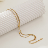 Bracelet tendance de luxe plaqué or en acier inoxydable étanche avec chaîne et breloques, designs variés, en stock pour femme, idéal pour les soirées