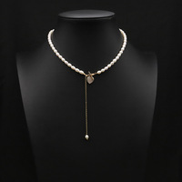 Collier de perles d'hiver à double rangée, chaîne de pull avec détail floral, perles d'eau douce, accessoires pour la saison froide, collier de perles