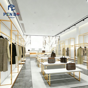 Exhibidores de Ropa de Alta Gama Personalizados para Tiendas de Zapatos, Bolsos y Ropa, Diseño Interior Dorado, Estantes para Exhibición de Vestidos de Mujer - Product Image 3