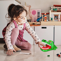 Roulette dentaire crocodile en gros avec dents en caoutchouc souple, jeu de morsure de main crocodile pour enfants, jouet de farce de table pour fête