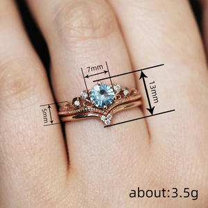 Anello di Fidanzamento T0909 con Corona in Oro Rosa, Topazio Taglio Brillante Rotondo, Incastonatura a Pavé, Gioielleria Raffinata da Donna - Product Image 5