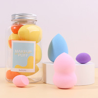 Éponge de maquillage en forme d'œuf, non latex, pour application humide et sèche, avec bouteille flottante en forme de goutte, incluse.