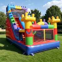 Château gonflable personnalisé coloré à thème briques de construction avec toboggan pour jeux extérieurs et location commerciale