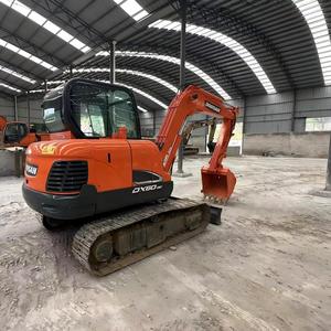 รถขุดไฮดรอลิก Doosan Dx60-9 มือสองคุณภาพสูง พร้อมมอเตอร์ปั๊ม PLC สำหรับใช้งานในฟาร์ม ขับเคลื่อนด้วยเครื่องยนต์ กำลังขุดสูง สีเดิมจากโรงงาน - Product Image 1