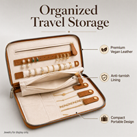 Étui de voyage marron zippé pour bijoux avec rouleaux à bagues, sangle pour boucles d'oreilles et pochette zippée
