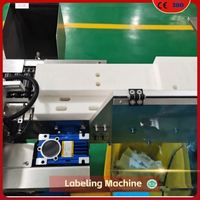 Machine d'étiquetage de petits flacons, applicateur d'étiquettes automatique haute précision pour les flacons et ampoules de l'industrie des sciences de la vie