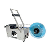Applicateur manuel d'étiquettes rondes pour bouteilles MT-50