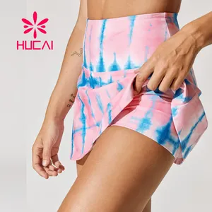 HUCAI OEM ODM高品质新设计标志升华印花网球服女孩运动运动裙定制女性网球裙