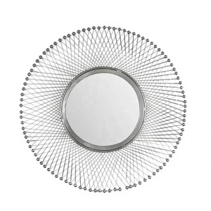 Miroir mural rond moderne avec cadre en métal géométrique, idéal pour la décoration intérieure contemporaine par Axiom Home Accents - Product Image 1
