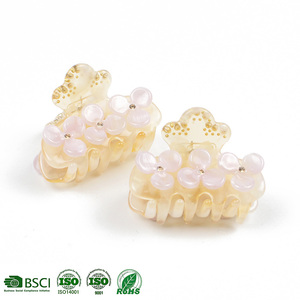 Pince à cheveux en acétate beige personnalisée de haute qualité avec des strass en forme de trois pétales de fleurs, par USA Glow & Brooks inc OBM - Product Image 1