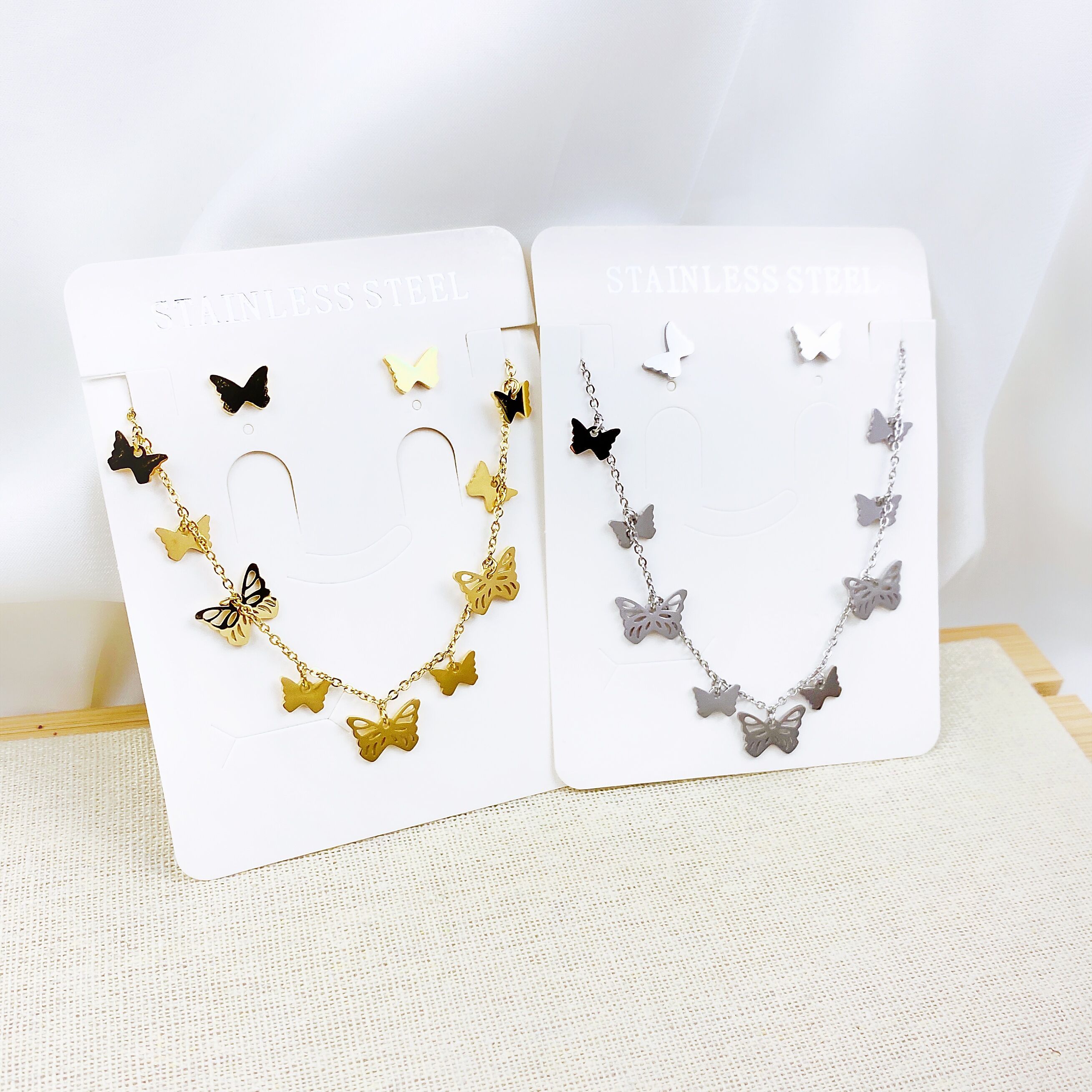 De moda Simple de plata al por mayor múltiples colgante de mariposa y chapado en oro mariposa pendientes joyería conjunto