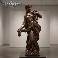 Sculpture d'ange en bronze, finition antique, taille réelle, figure féminine ailée, panier de fruits, art métallique, pour hall d'hôtel, fabrication sur mesure