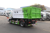 Camion à ordures compacteur Howo 7cbm 4X2, boîte de vitesses manuelle, camion à ordures hydraulique à levage par crochet