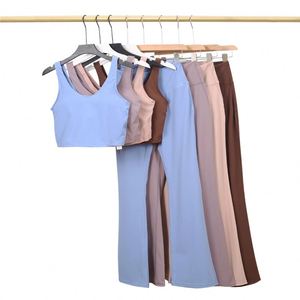 Completo sportivo con pantaloni a vita alta, top a U, reggiseno sportivo effetto seconda pelle, top yoga con schiena scoperta - Product Image 1