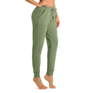 Pantalones deportivos transpirables para mujer, con bolsillos laterales, para hacer ejercicio al aire libre, pantalones de chándal de algodón para gimnasio y fitness, en venta en línea. - Product Image 1