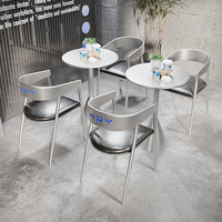 Ensemble de mobilier de café moderne en fer avec option de logo personnalisé, table et chaises argentées pour hôtels/magasins de centres commerciaux