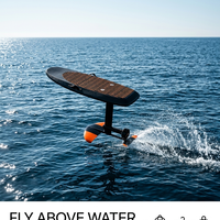 Nouveauté : Planche de surf électrique hydrofoil 8KW en fibre de carbone, orange, avec pad de traction géométrique linéaire en EVA et hélice à batterie
