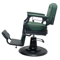 Fauteuil de Barbier de Style Antique Vert Foncé avec Cadre Métallique Ornemental, Base Hydraulique Ronde et Appui-tête Intégré pour Projet de Salon de Luxe