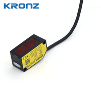 Sensor de Desplazamiento láser CMOS de tamaño compacto KRONZ, interruptor de salida doble y Sensor fotoeléctrico analógico de 30mm 12V ~ 24VDC con cable