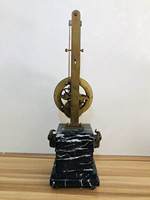 Horloge mécanique à pendule à balançoire suspendue squelette inversé, style moulin à vent antique mystérieux, avec tête de bête en laiton et base en marbre