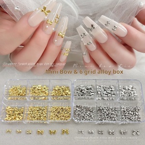 Adornos de Uñas de Aleación con Forma de Mariposa y Lazo, Decoración de Uñas, 6 Compartimentos, Venta al por Mayor de Fábrica, Dijes de Uñas Personalizados en Bolsas a Granel - Product Image 1