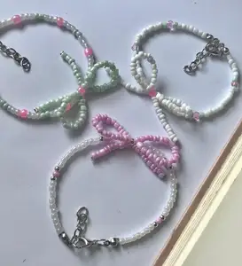 Bulk Custom Handgemaakte Armband Zomer Kleurrijke Stapelbare Schattige Boog Kristal Roze Glas Zaad Ambachtelijke Sieraden Voor Vrouwen Kralen Armband