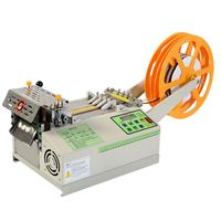 Máquina de corte de cinta de nailon/poliéster de alta precisión con motor eléctrico accionado por engranajes y control PLC automático