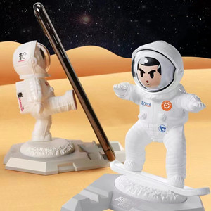 NUEVO astronauta de dibujos animados pequeño <span class=keywords><strong>espacio</strong></span> hombre <span class=keywords><strong>en</strong></span> forma de tableta soporte de escritorio de mesa divertido soporte para teléfono móvil - Product Image 2
