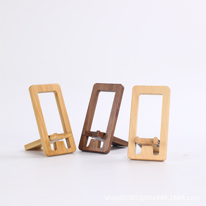Solid wood phone <b>stand</b>, rotatable and foldable portable desktop base, black walnut wood, new type of lazy <b>stand</b>. - Product Image 4