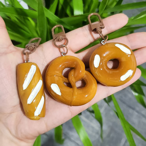 Carino 3D divertente giocattolo cibo pane in resina portachiavi cibo cartone animato Bagel Bagel pane Pretzel custodia per telefono Charm borsa ciondolo portachiavi auto - Product Image 2
