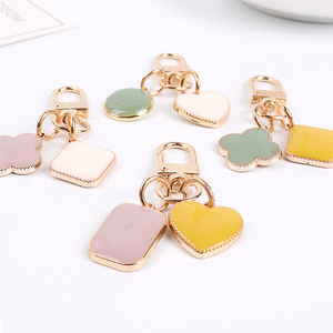 Protección para auriculares Simple en forma de corazón geométrico funda de goteo de aceite llavero pareja llave de coche creativa accesorios de bolsa bonita - Product Image 3