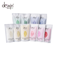 Perles de cire de colophane rose perle rose OEM cire chaude dépilatoire pour l'épilation visage lisse zone de bikini sacs emballés à la noix de coco aloès