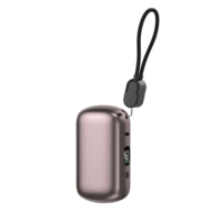 Nouveaux produits en gros en promotion : Mini batterie externe portable en alliage PD22.5W à charge rapide 10000mAh avec câble pour téléphones