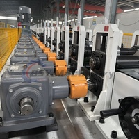 Machine de formage de tubes Omega à volet automatique, machine de découpe pneumatique de profilés Omega, machine de portes enroulables avec contrôle PLC