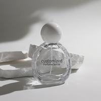 Flacon de parfum en verre transparent de luxe à motif rayé de 100 ml avec pompe pulvérisatrice et couvercle plat en verre épais