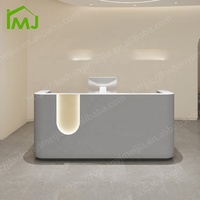 Mobilier moderne de luxe pour salon de beauté et spa Table de réception en bois Comptoir de caisse à vendre
